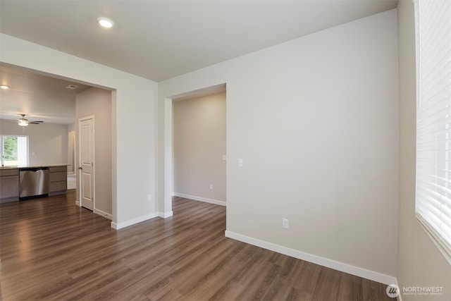 unfurnished room featuring recessed lighting, ceiling fan, baseboards, and dark wood-style flooring