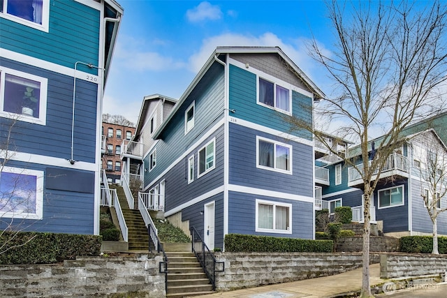 view of front of home with stairs