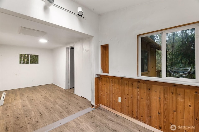 unfurnished room featuring wood finished floors