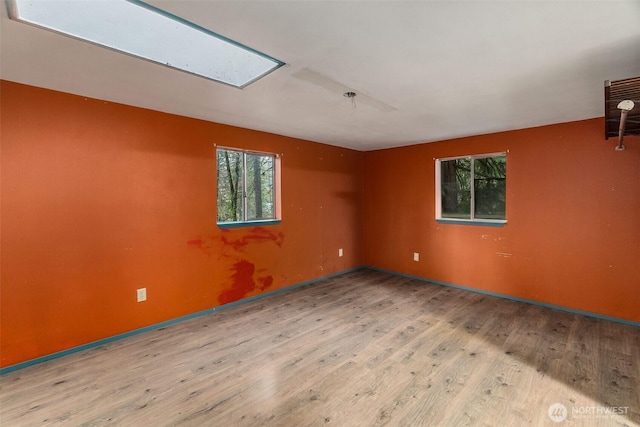 unfurnished room featuring wood finished floors