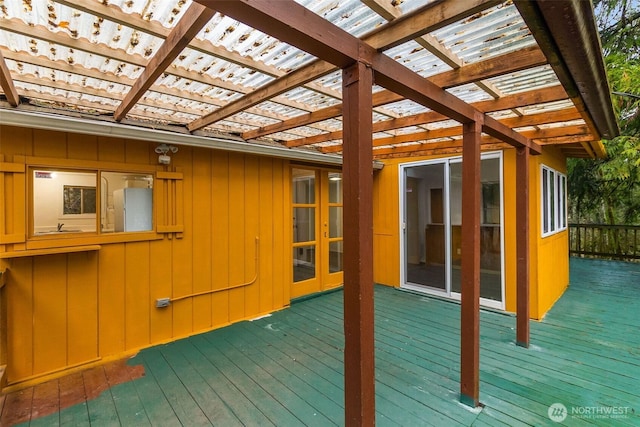 wooden deck featuring a pergola