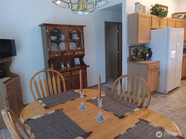 dining area with a chandelier