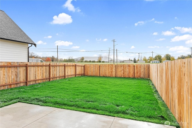 view of yard featuring a fenced backyard