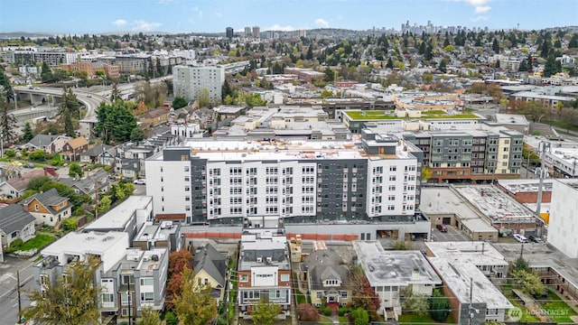 birds eye view of property featuring a city view