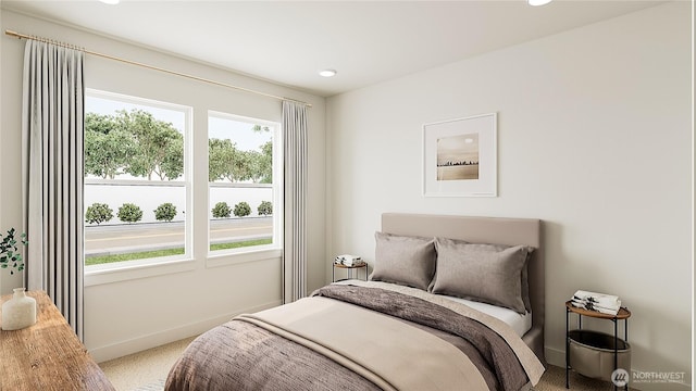 bedroom featuring carpet flooring and baseboards