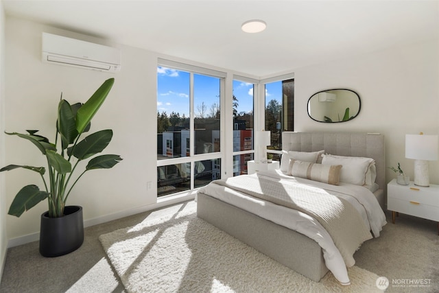 carpeted bedroom with baseboards, floor to ceiling windows, and a wall mounted AC