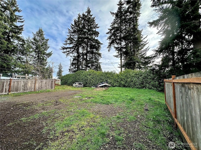 view of yard with fence