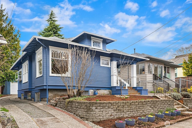 view of front of home with an outdoor structure