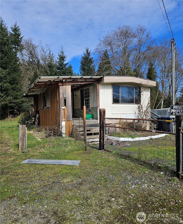 view of front of property with fence