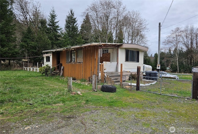 view of outdoor structure featuring fence