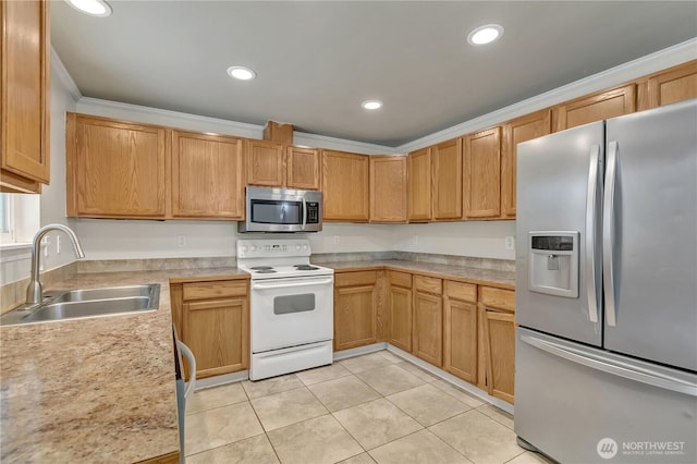 kitchen featuring crown molding, light countertops, appliances with stainless steel finishes, light tile patterned flooring, and a sink