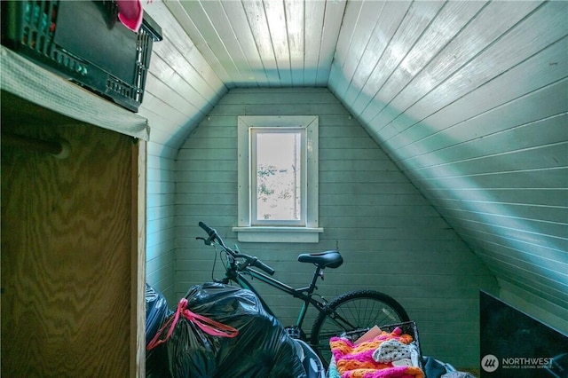 additional living space featuring wooden ceiling and vaulted ceiling