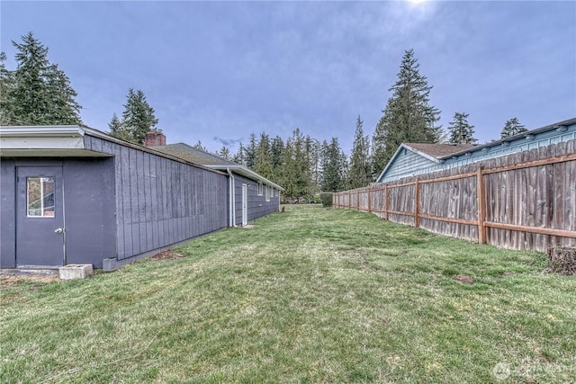 view of yard with fence