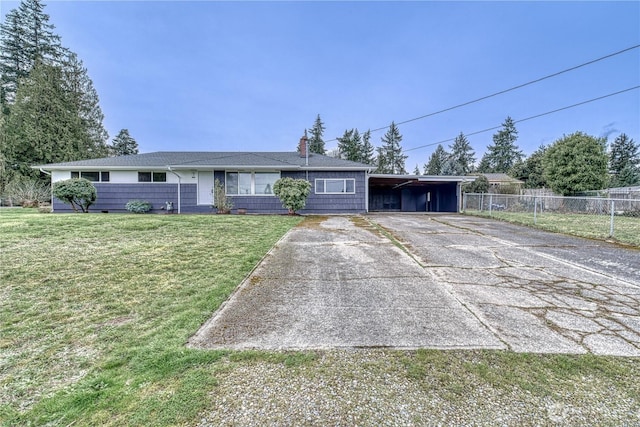 single story home with a front lawn, driveway, fence, a carport, and a chimney