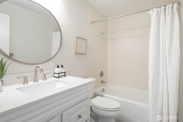 full bath featuring toilet, vanity, and shower / bath combination with curtain