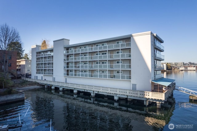 view of property with a water view