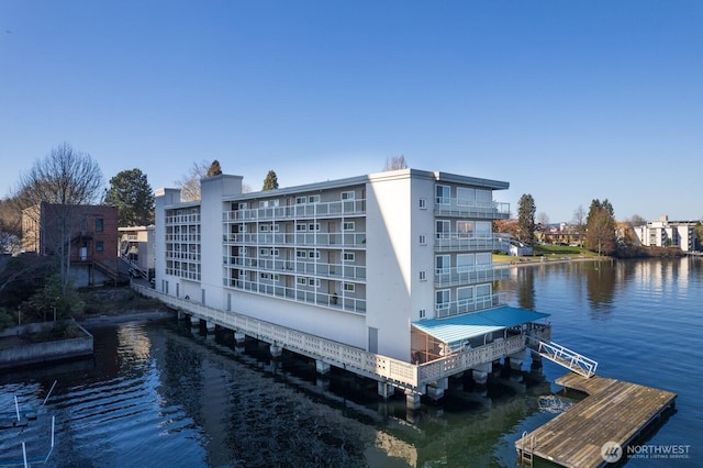 view of building exterior featuring a water view