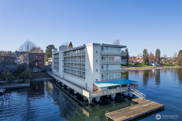 dock area with a water view