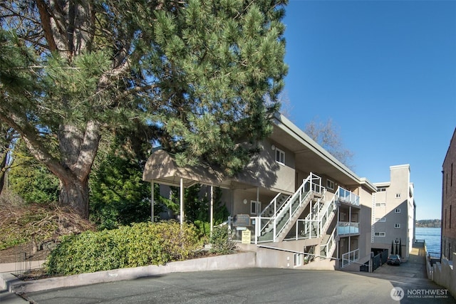 view of property with stairway