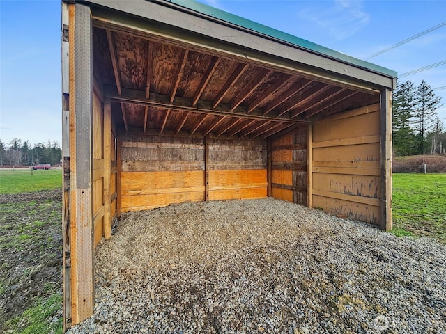 view of outdoor structure featuring a carport and an outdoor structure