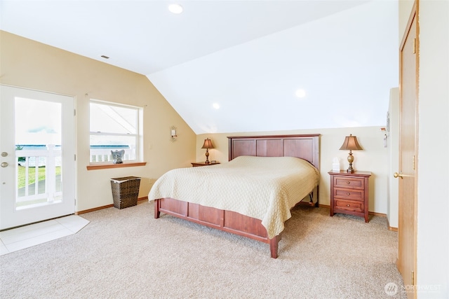 carpeted bedroom featuring access to exterior, baseboards, and lofted ceiling