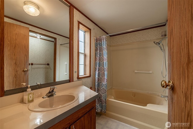 full bathroom with tile patterned floors, vanity, shower / tub combo with curtain, and ornamental molding