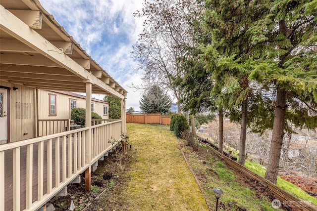 view of yard with fence