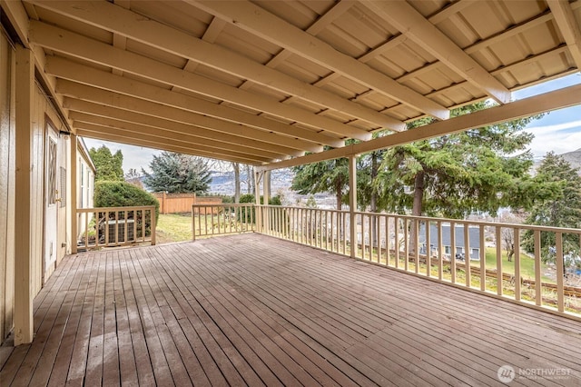 wooden deck featuring fence