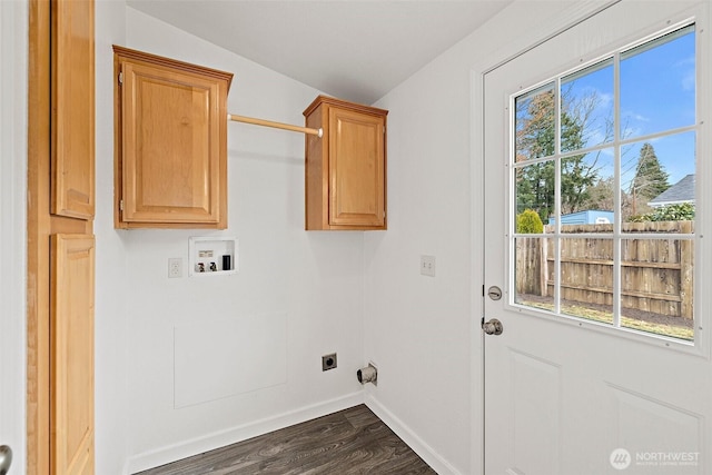 clothes washing area featuring baseboards, washer hookup, cabinet space, hookup for an electric dryer, and dark wood-style flooring