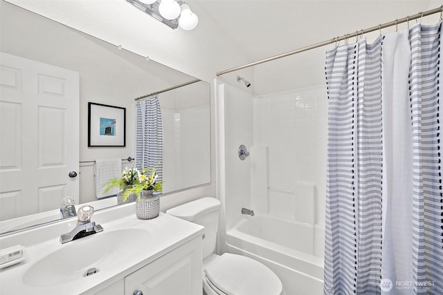 full bathroom featuring toilet, shower / bath combo, and vanity