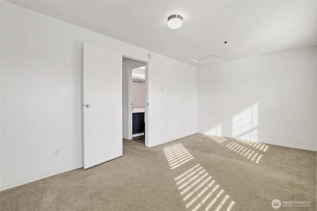 unfurnished room featuring carpet floors