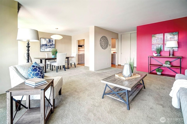 living area with carpet flooring