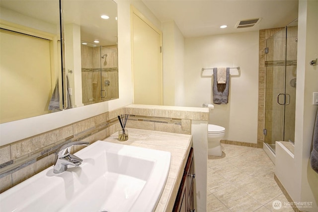 full bath featuring visible vents, a stall shower, toilet, and vanity