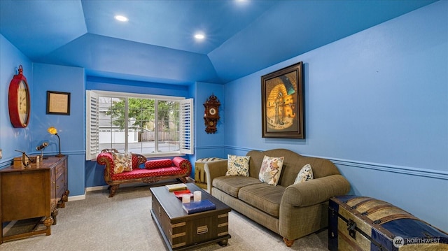 living area featuring vaulted ceiling, recessed lighting, carpet, and baseboards