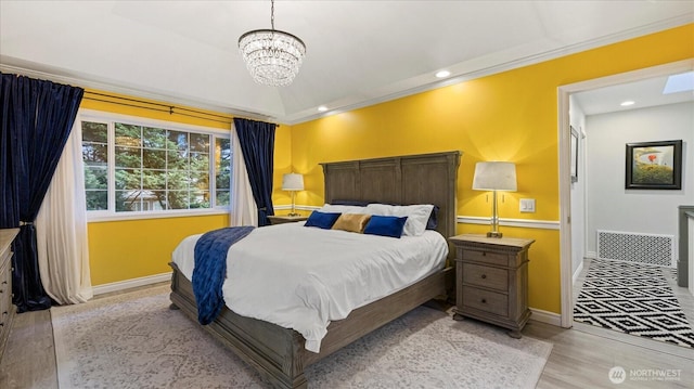 bedroom featuring ornamental molding, wood finished floors, recessed lighting, an inviting chandelier, and baseboards