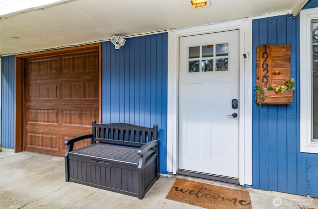 property entrance featuring a garage