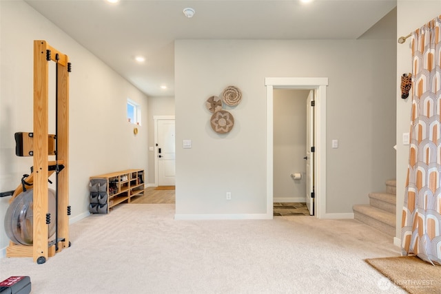 interior space with carpet flooring, recessed lighting, and baseboards