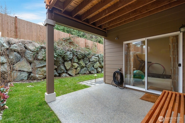 view of patio with fence