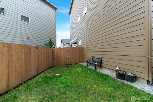 view of yard featuring fence