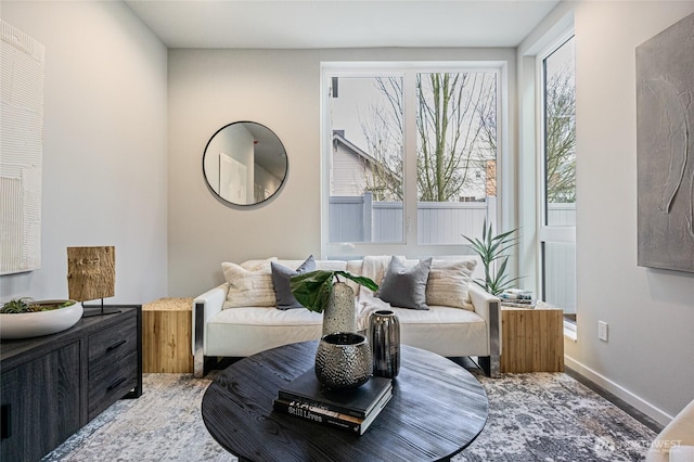 sitting room featuring baseboards