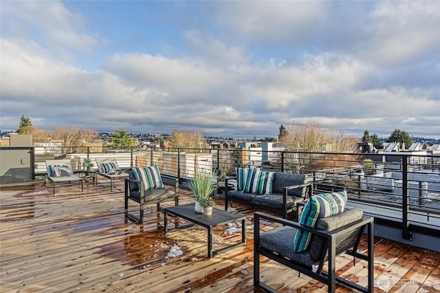 wooden deck featuring an outdoor living space