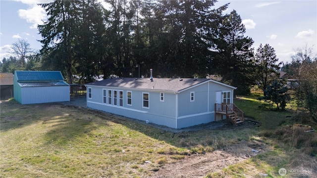 exterior space with a yard, an outbuilding, and a shed