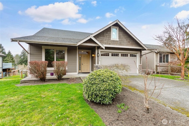 view of front facade with aphalt driveway, an attached garage, a shingled roof, and a front lawn