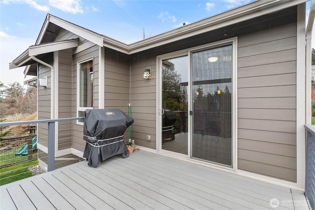 deck featuring grilling area