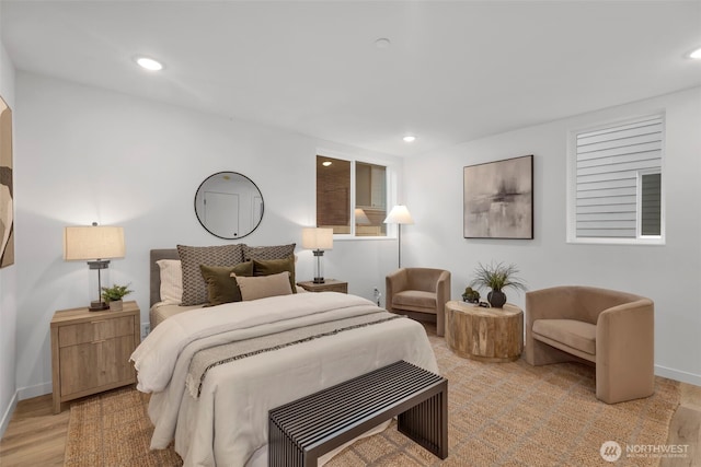 bedroom featuring recessed lighting, baseboards, and light wood finished floors