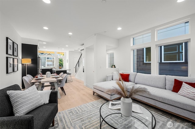 9211A Densmore Ave N, Seattle, WA 98103 - living area with stairway, recessed lighting, and light wood finished floors
