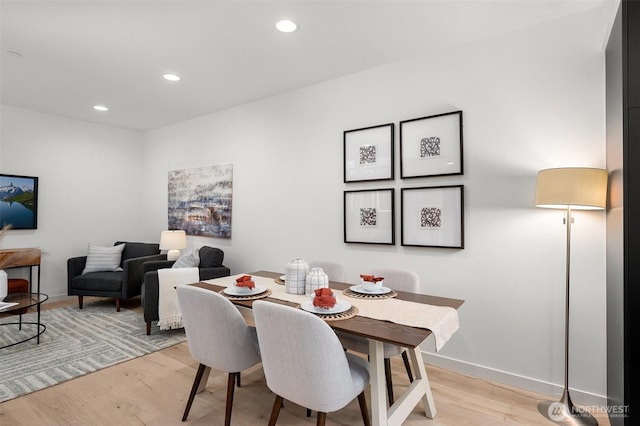 9211A Densmore Ave N, Seattle, WA 98103 - dining space with recessed lighting, baseboards, and light wood-style floors