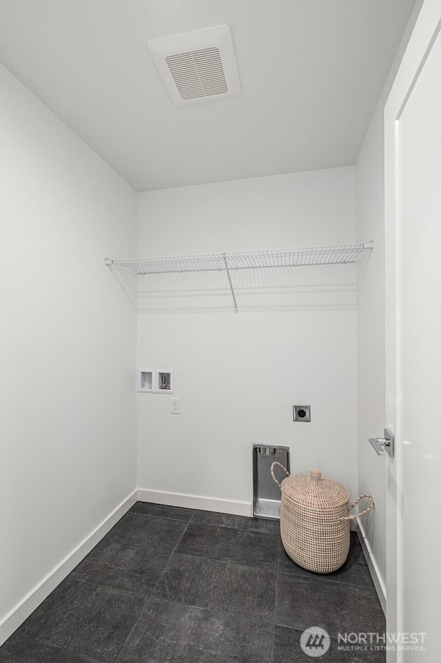 9211A Densmore Ave N, Seattle, WA 98103 - laundry room with visible vents, washer hookup, baseboards, hookup for an electric dryer, and laundry area