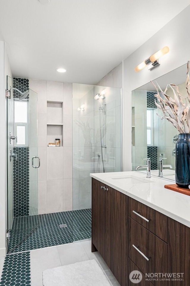 9211A Densmore Ave N, Seattle, WA 98103 - full bathroom featuring vanity, a shower stall, and tile patterned flooring