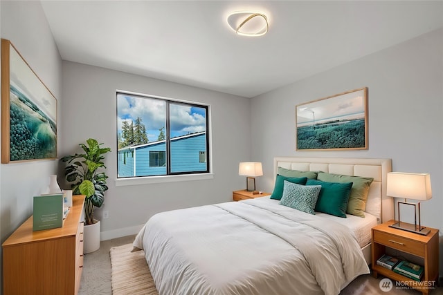 bedroom featuring baseboards